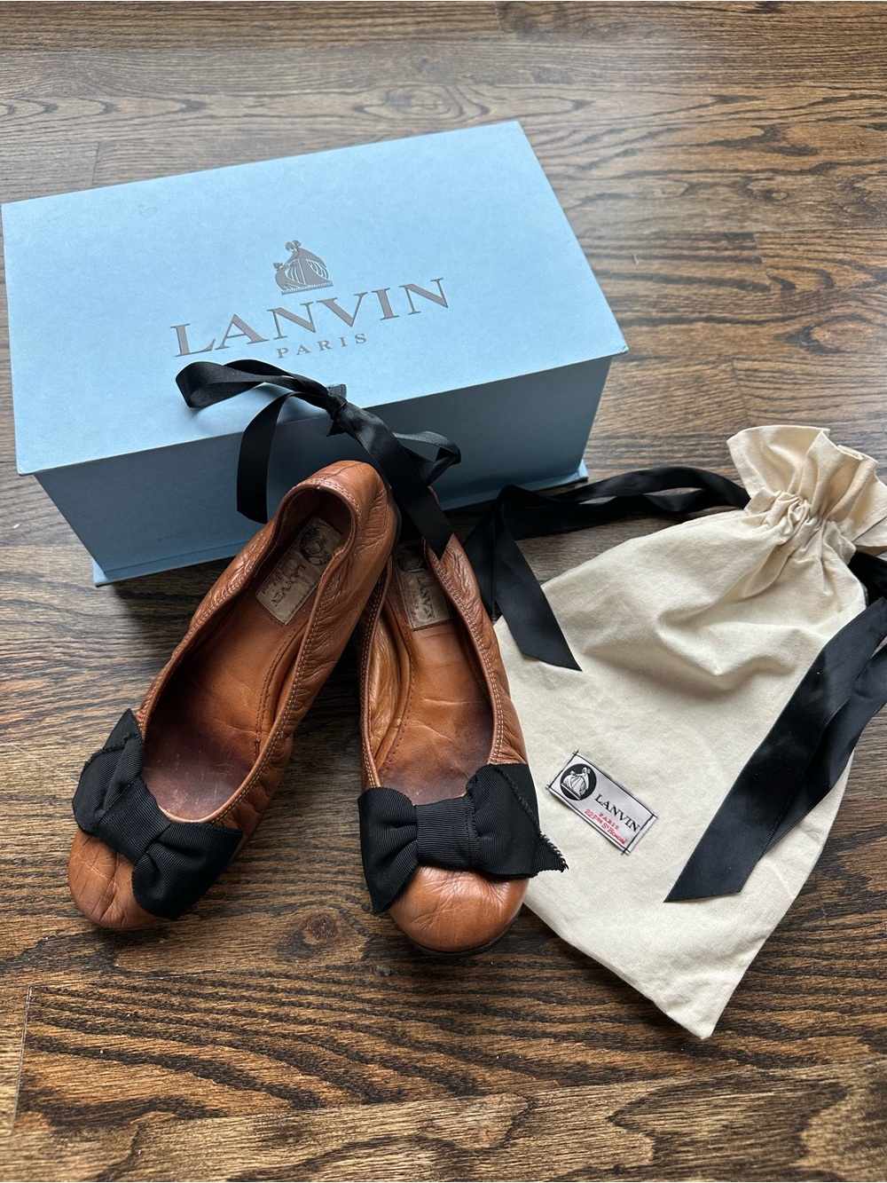 Lanvin cognac brown leather ballet flats with black bow